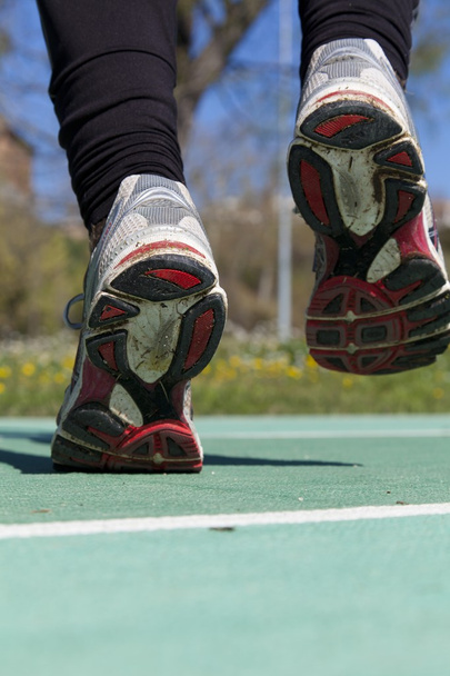 Athlete running on a track - Foto, imagen