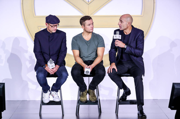 (From left) British film producer and director Matthew Vaughn, British actors Taron Egerton, and Mark Strong attend a press conference to promote their new movie "Kingsman: The Golden Circle" in Shanghai, China, 12 October 2017 - 写真・画像