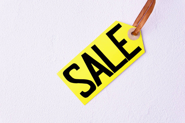 seasonal sale, price tag on white background - Fotografie, Obrázek