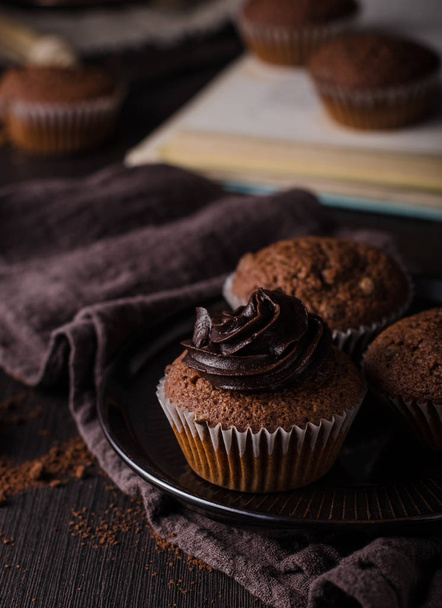 Homemade chocolate muffins with chocolate topping, delish and simple dessert - 写真・画像