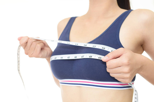 Woman measuring her breast - Foto, Bild