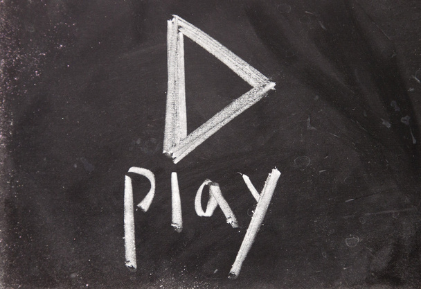 play sign drawn with chalk on blackboard - Photo, Image