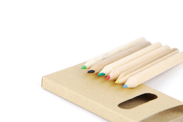 Colour pencils and pencil case on white - Fotó, kép
