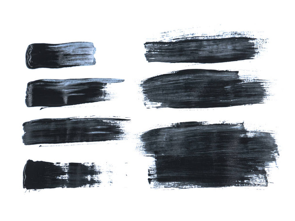 Black acrylic paint stroke isolated on white background, abstract art concept - Φωτογραφία, εικόνα