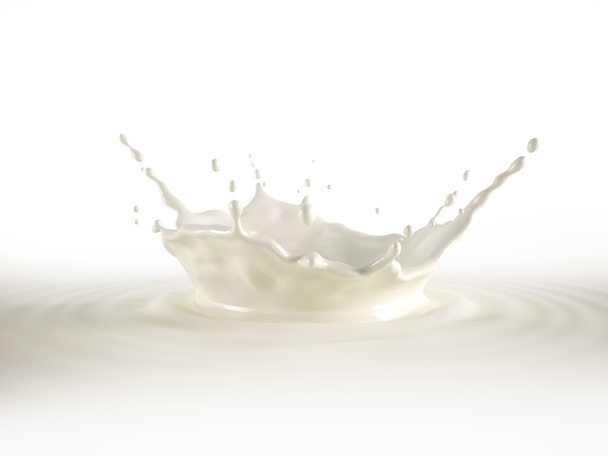 Milk crown splash, splashing in milk pool with ripples. Isolated on white background. Clipping path included. - Photo, Image