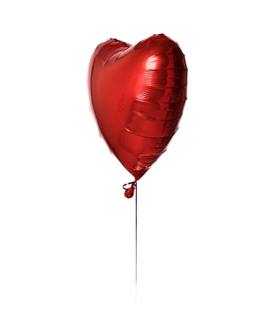 Single big  red heart balloon object for birthday party or valentines day isolated on a white background - Φωτογραφία, εικόνα