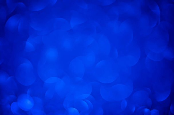 Μπλε Bokeh στρογγυλό σχήμα φόντου. Ευχετήρια κάρτα γενεθλίων με φωτεινό μπλε glitter φώτα για την ημέρα του Αγίου Βαλεντίνου, της μητέρας ή γυναίκες. Studio που γυρίστηκε - Φωτογραφία, εικόνα