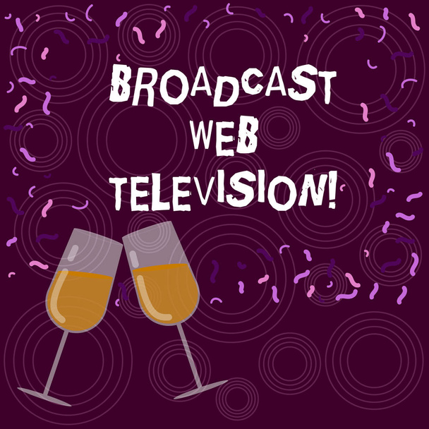 Writing note showing Broadcast Web Television. Business photo showcasing media presentation dispersed over the Internet Filled Wine Glass for Celebration with Scattered Confetti photo. - Photo, Image