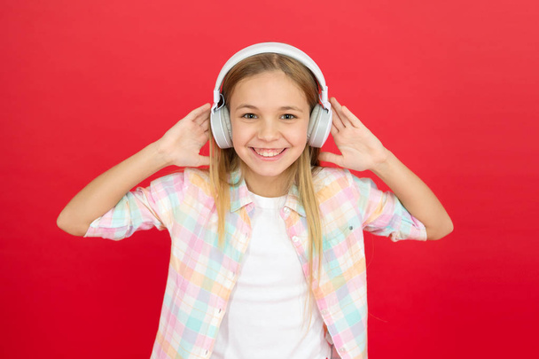 Get music account subscription. Enjoy music concept. Music always with me. Leisure concept. Little girl listen song headphones. Online radio station channel. Girl child listen music modern headphones - Foto, immagini