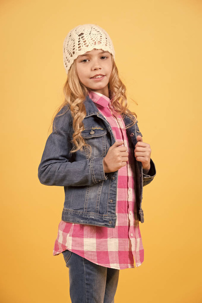 Girl model in jeans suit, hat, plaid shirt - Foto, afbeelding