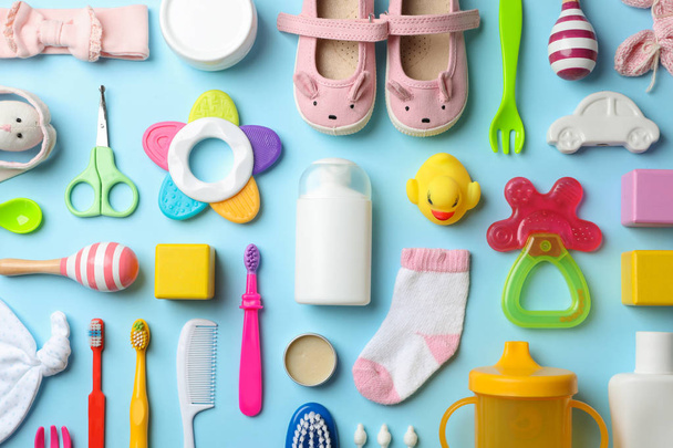 Flat lay composition with baby accessories and toys on color background - Fotoğraf, Görsel