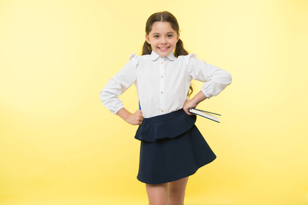 Education online. small girl child. private teaching. Smart school girl. childrens day. happy little girl in school uniform. Back to school. Childhood happiness. Confident in her knowledge - Foto, immagini