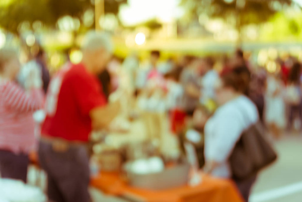 Filtered image blurry background diverse people at serving line  - Photo, Image