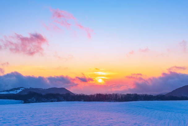 Amazing beautiful vibrant winter sunset in the mountains - Zdjęcie, obraz