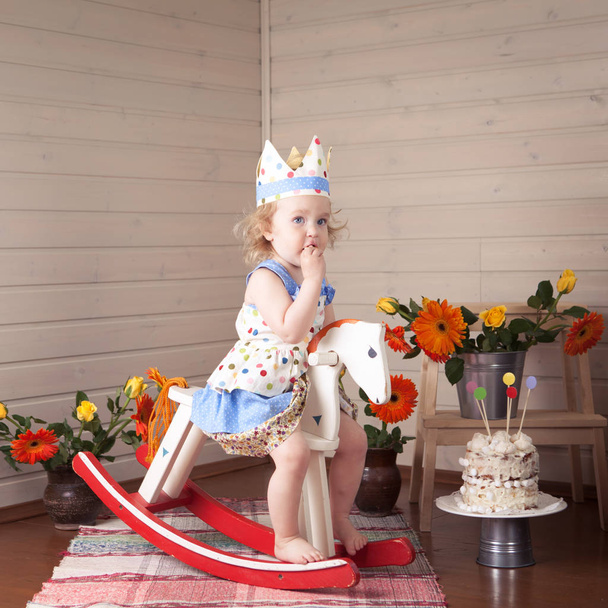 Happy Fancy Beautiful cute baby girl celebrates birthday, fun birthday with pretty little girl. - Fotografie, Obrázek