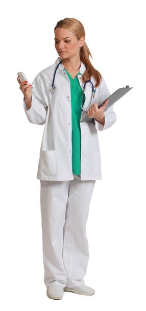 Yound Woman Doctor Reading a Phone Message - Photo, Image