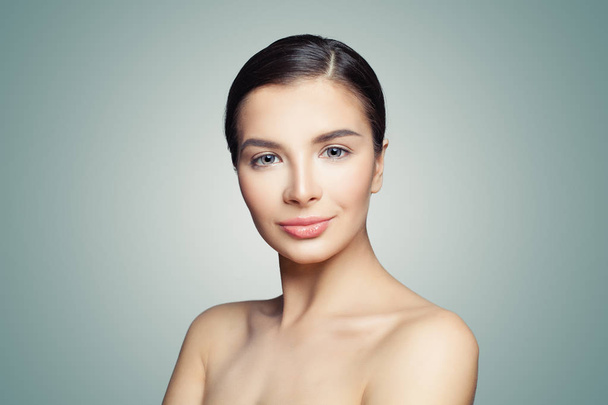 Красивое лицо. Здоровая женщина с идеальной чистой кожей. Процедуры для лица, кожи и спа
 - Фото, изображение