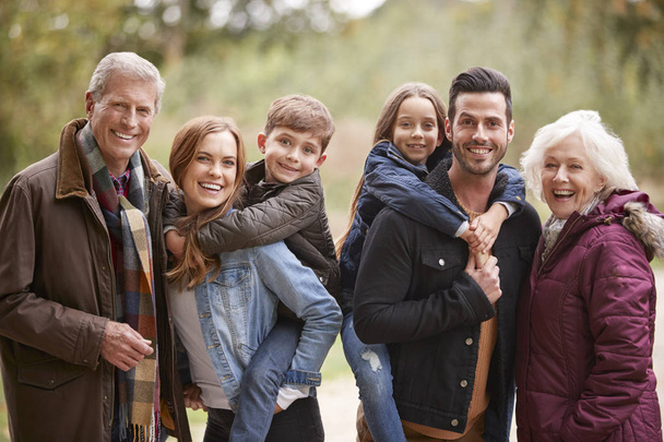 Portrait Of Multi Generation Family On Autumn Walk In Countryside Together - Φωτογραφία, εικόνα
