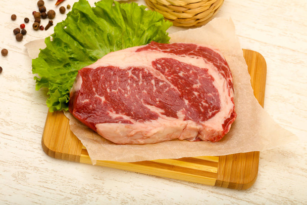 Rib eye raw steak ready for cooking - Photo, image