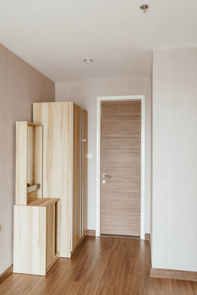 beautiful wooden wardrobe in a room - Foto, Bild