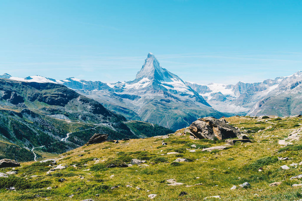 Beautiful mountain landscape with views of the Matterhorn peak in Zermatt, Switzerland. - Fotoğraf, Görsel
