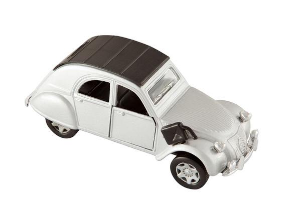 klassieke zilveren speelgoedauto met uitknippad - Foto, afbeelding