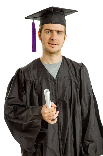 Gelukkig jonge man na zijn afstuderen, geïsoleerd op wit - Foto, afbeelding