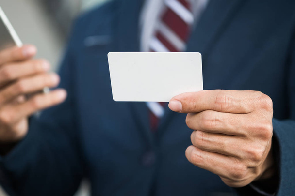 business man hold card - Фото, зображення