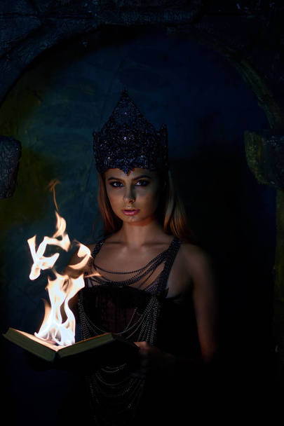 Portrait of a Gothic Princess. Beautiful young brunette woman in metal crown - Foto, imagen
