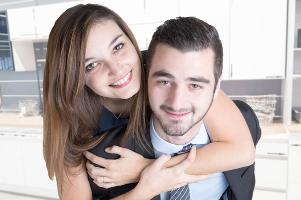Close-up of man woman couple smiling in kitchen home in love - Photo, Image