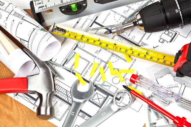 close-up view of blueprint and various construction tools, maintenance concept - Zdjęcie, obraz