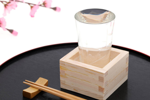 japanese wooden box masu with sake isolated on white background - Photo, Image