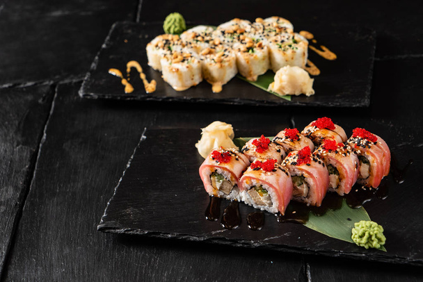 sushi on the black background  - Image - Foto, Imagem