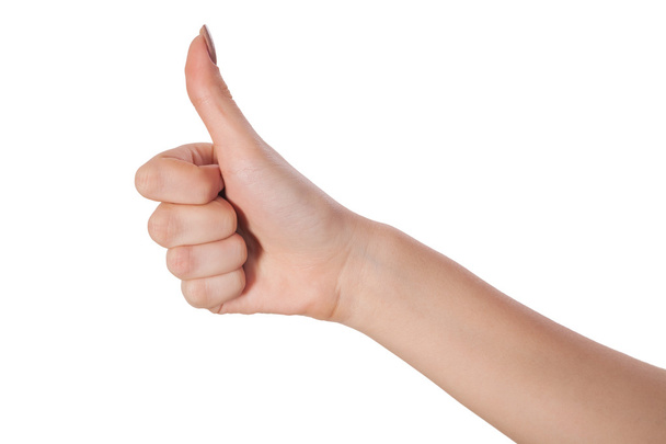 Female hand showing thumbs up sign isolated on white - Photo, image