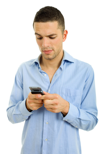 Young casual man with a phone - Fotoğraf, Görsel