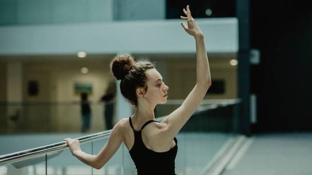 Young elegant ballerina dancing in ballet studio  - Valokuva, kuva