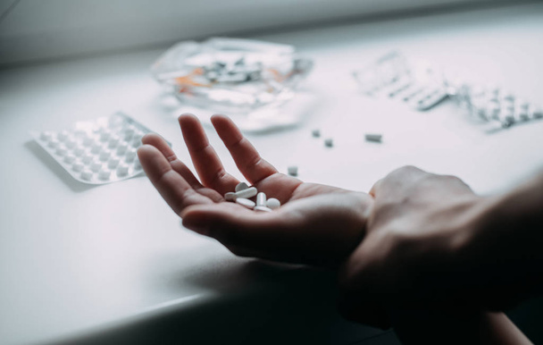 Close view of hand full of pills - Foto, Imagem