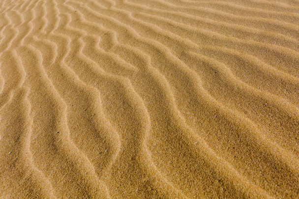 Beige zand oppervlakte, natuurlijke achtergrond - Foto, afbeelding