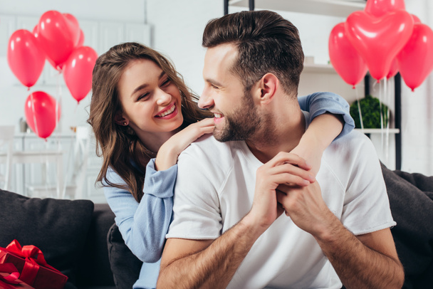 loving young couple celebrating st valentine day at home - Foto, Bild