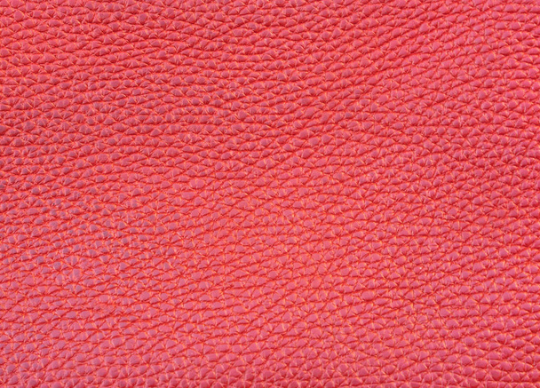 Шкіряна текстура фону живого коралового кольору. Концепція кольору року
. - Фото, зображення