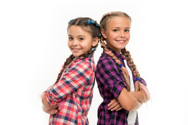 Happy little sisters. Beauty and fashion. small kid fashion. Childhood happiness. Friendship and sisterhood. childrens day. Back to school. small girl children with perfect hair. Ready to study - Фото, зображення