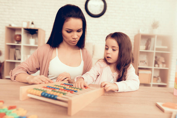 Girl and Woman Play Interesting Kids Game at Home. - Foto, Imagem