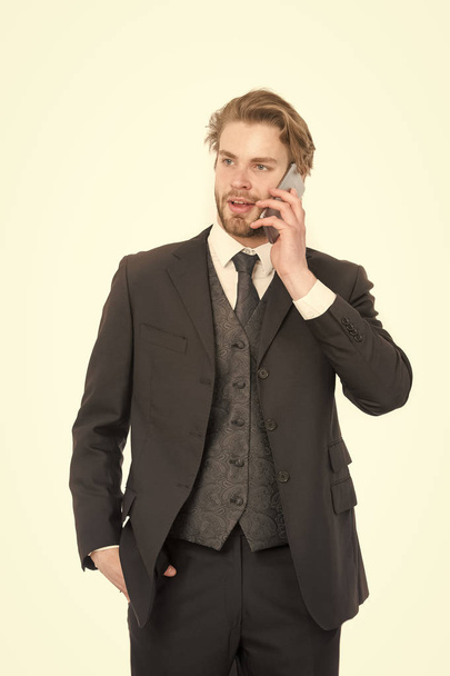 Man in formal outfit with mobile phone. - Foto, Bild