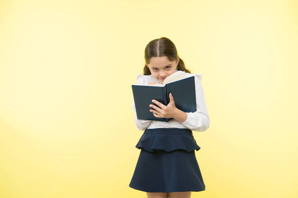Education online. Smart school girl. childrens day. happy little girl in school uniform. small girl child. private teaching. Back to school. Childhood happiness. Concentrated on exam - Fotó, kép