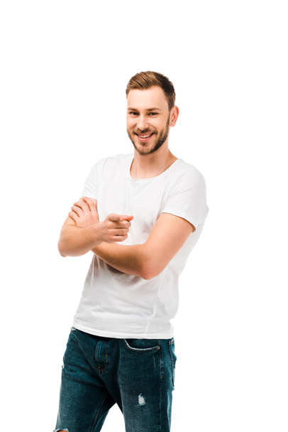 handsome happy man pointing with finger and smiling at camera isolated on white - Fotó, kép