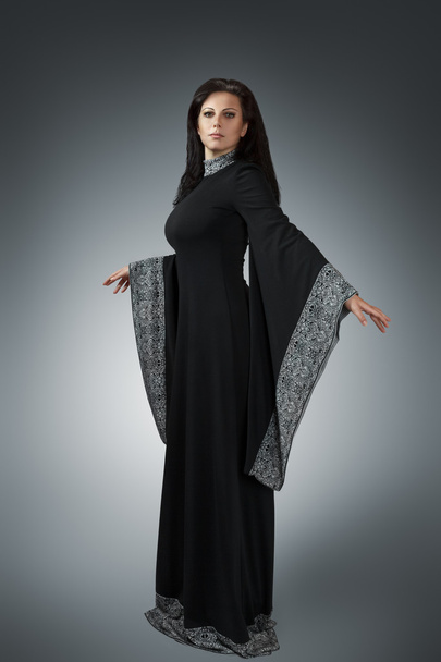 Young woman in medieval dress - Fotoğraf, Görsel