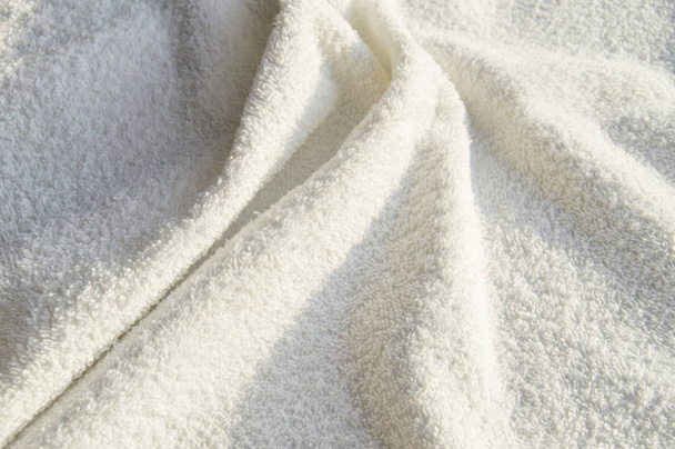 Asciugamano morbido Terry bianco per trattamenti SPA, texture, sfondo. - Foto, immagini