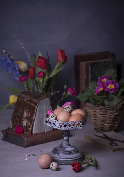 Happy Easter card template with eggs, flowers and cup with tea - Photo, Image