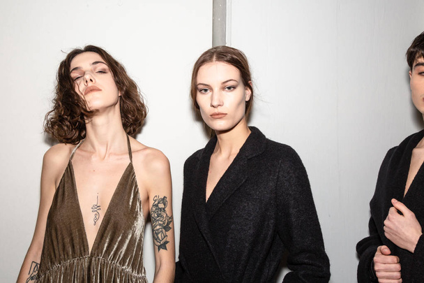 MILAN, ITALY - JJANUARY 14: Beautiful models pose in the backstage just before Sartorial Monk show during Milan Men's Fashion Week on JANUARY 14, 2019 in Milan. - 写真・画像
