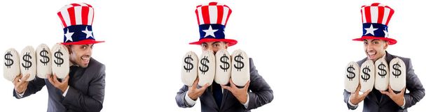 Άνθρωπος με αμερικανική καπέλο με moneybags  - Φωτογραφία, εικόνα